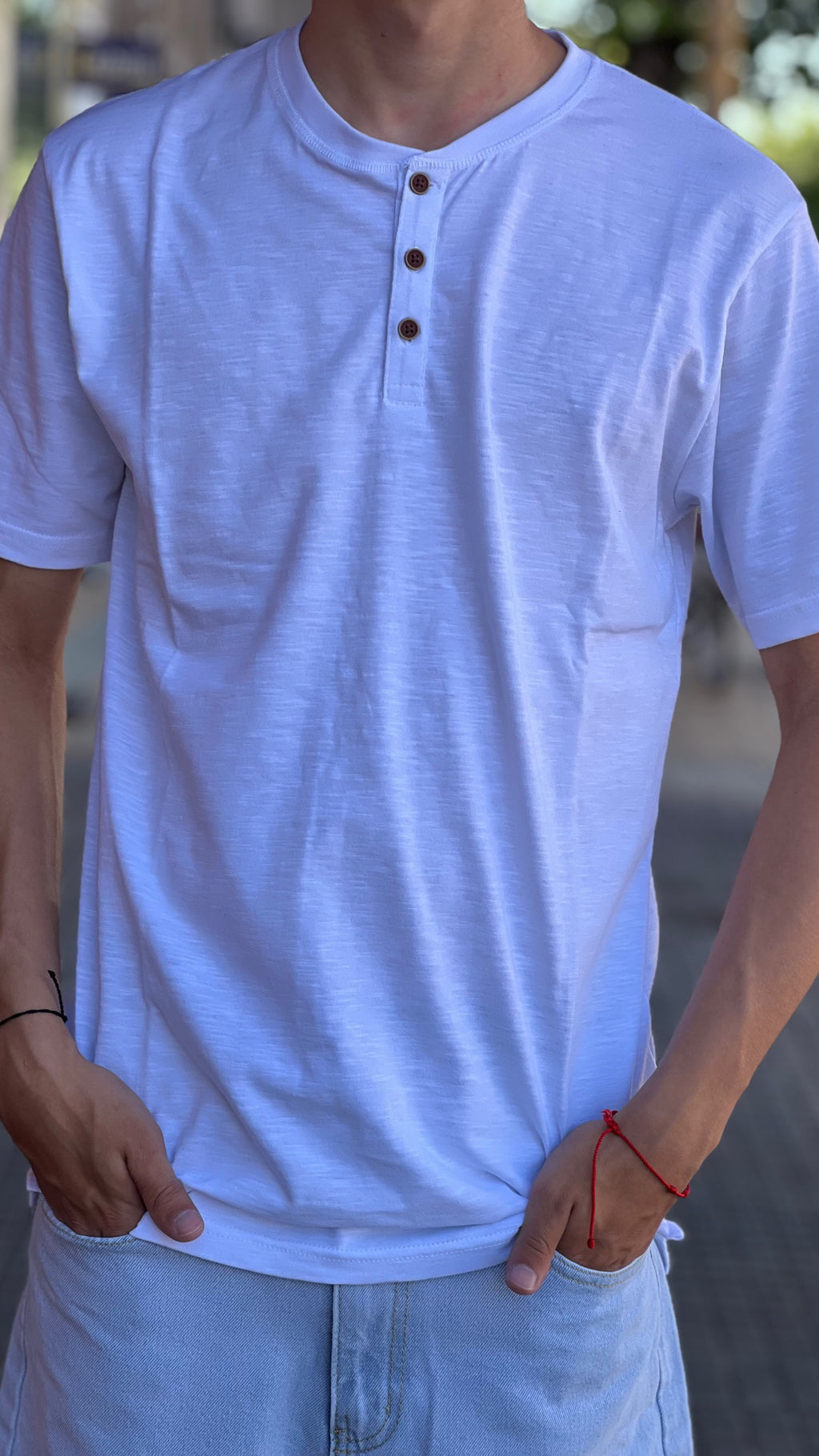 Remera botones